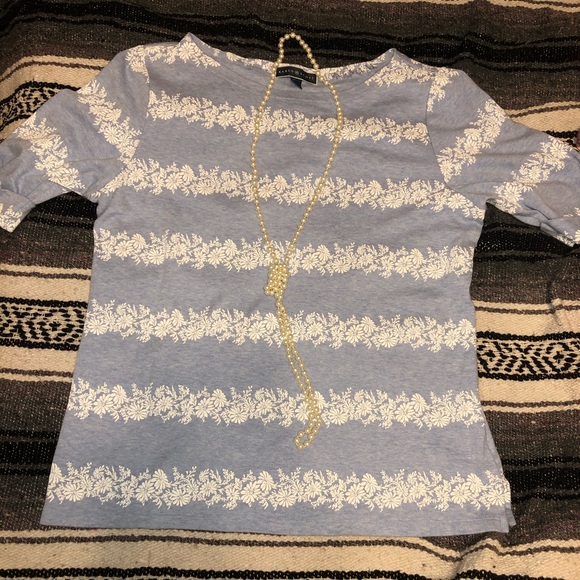 Cute light blue shirt with pearl necklace - Picture 2 of 3